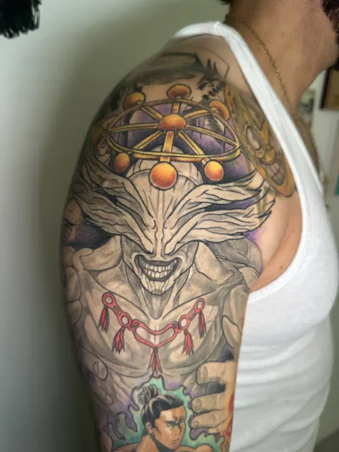 Anime shoulder view with a grinning nine-tailed fox spirit beneath the golden rings