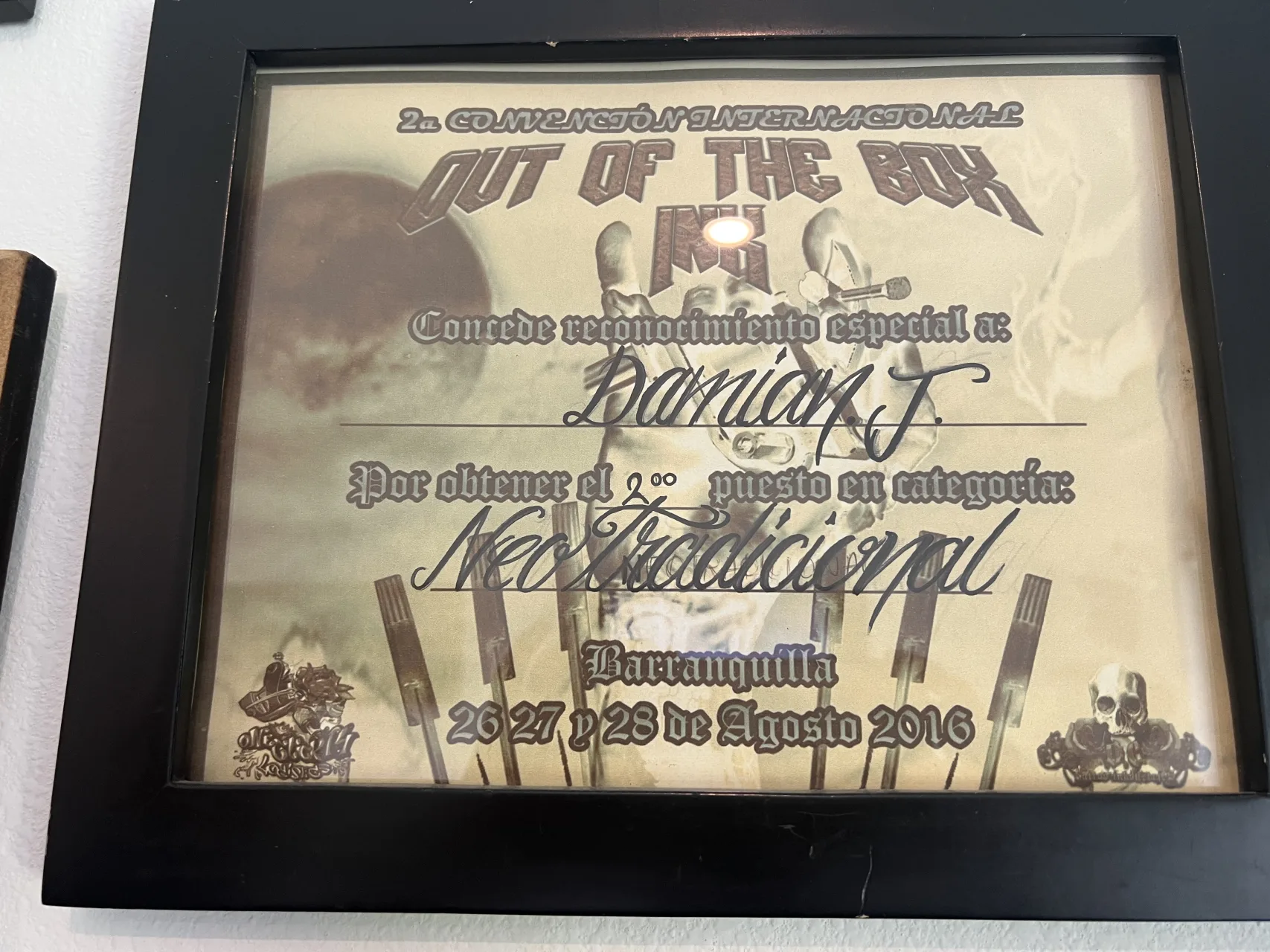 Two framed diplomas from Out of the Box Ink Barranquilla 2016, second place neo-traditional and old school